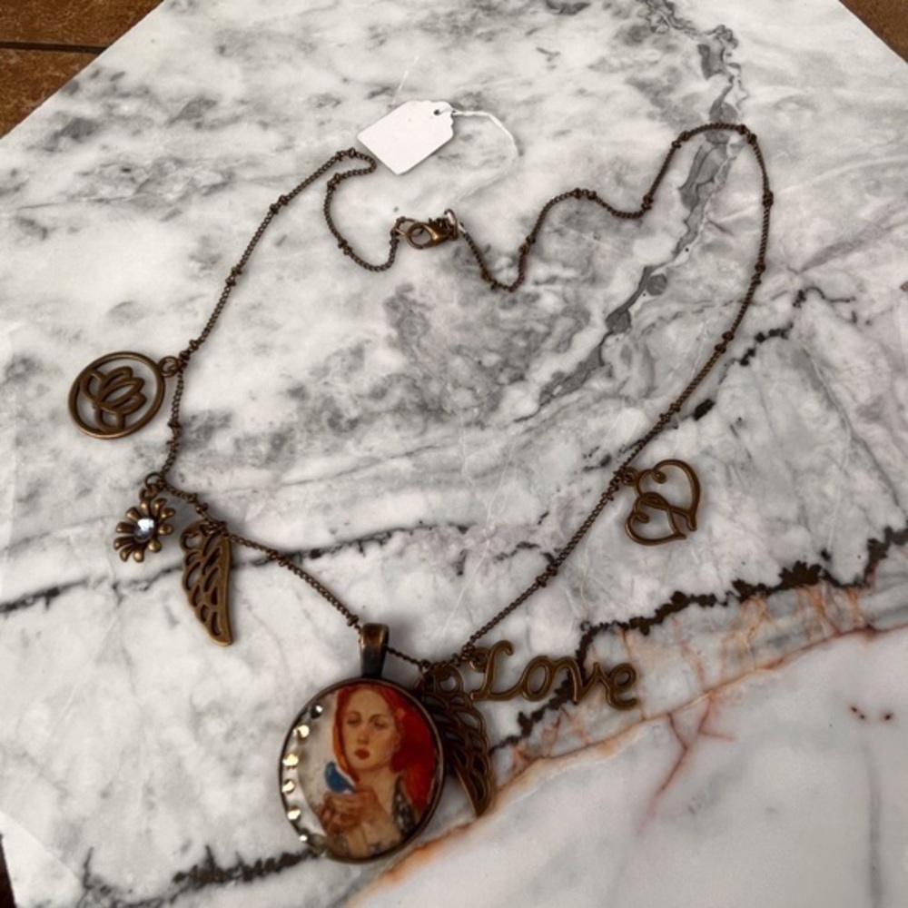 Handmade necklace with portrait and charms